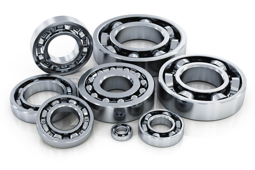 A few different wheel bearings are shown in a pile