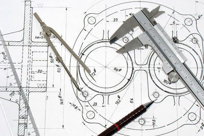 Investment casting drawing with ruler and pencil lying on top