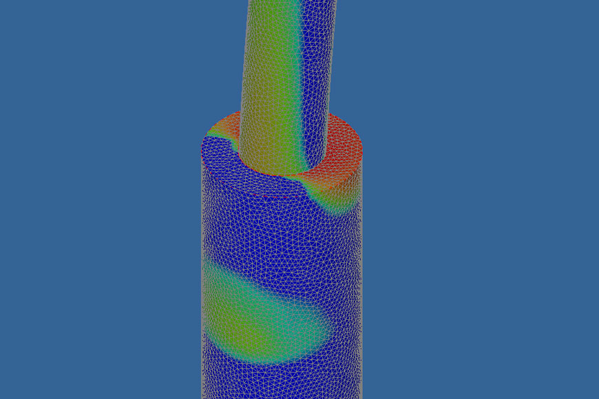 A simplified wireframe image of a bollard in a concrete with mesh reporting von Mises stresses