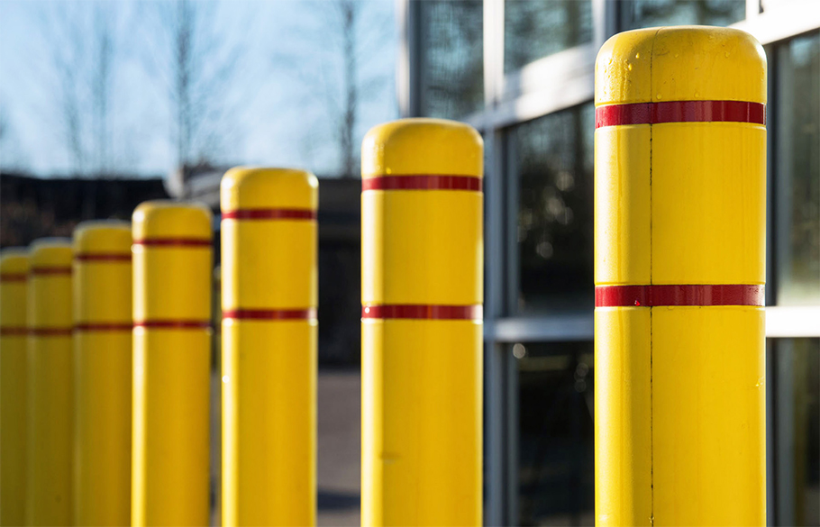 A row of bollards fitted with Reliance Foundry’s plastic post covers